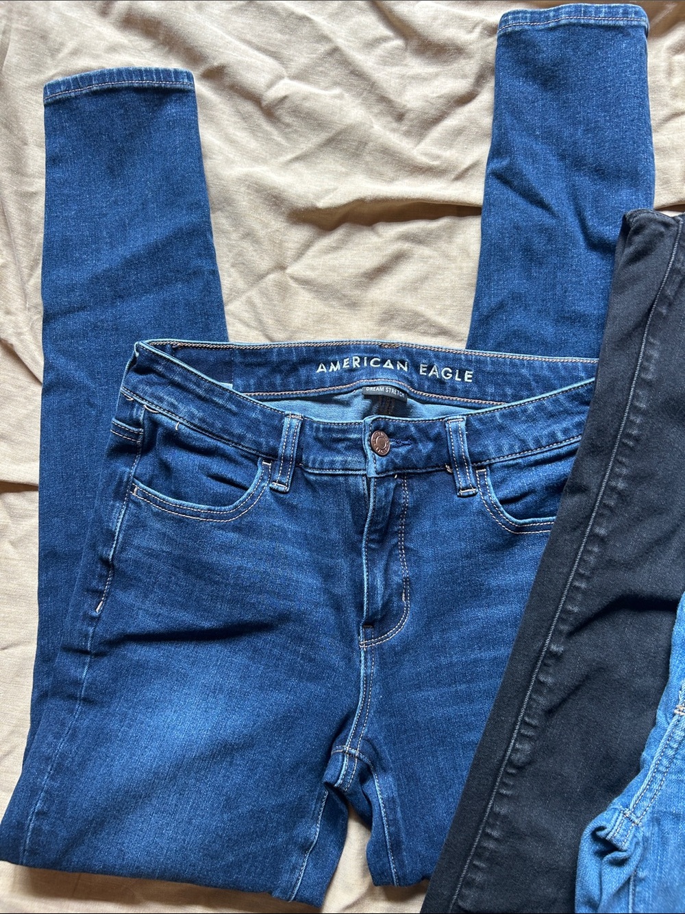 American Eagle Outfitters Skinny Jeans Trio in Dark Blue, Light Blue, and Black - Picture 3 of 7
